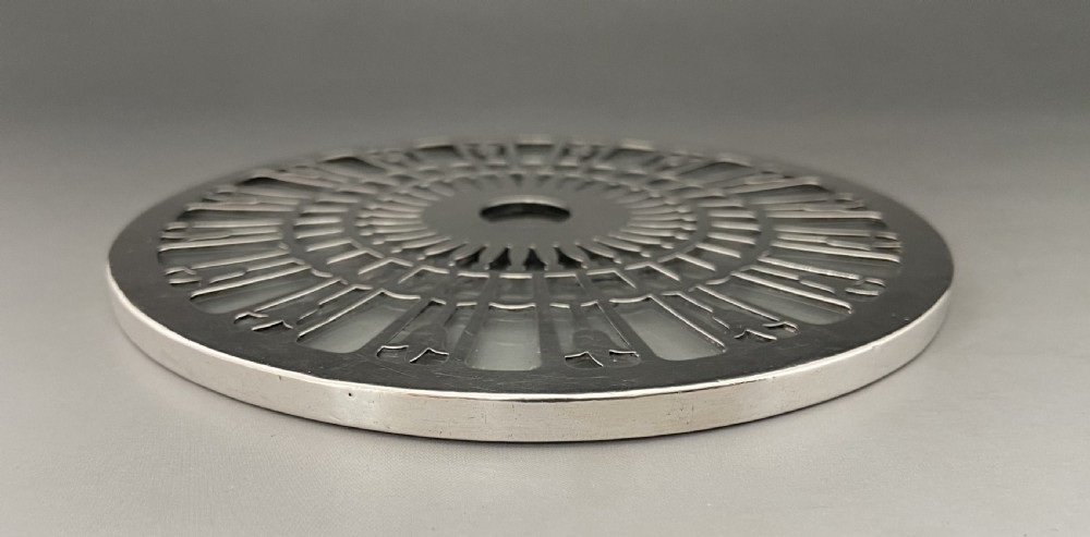 A lovely silver mounted teapot stand/coaster View III