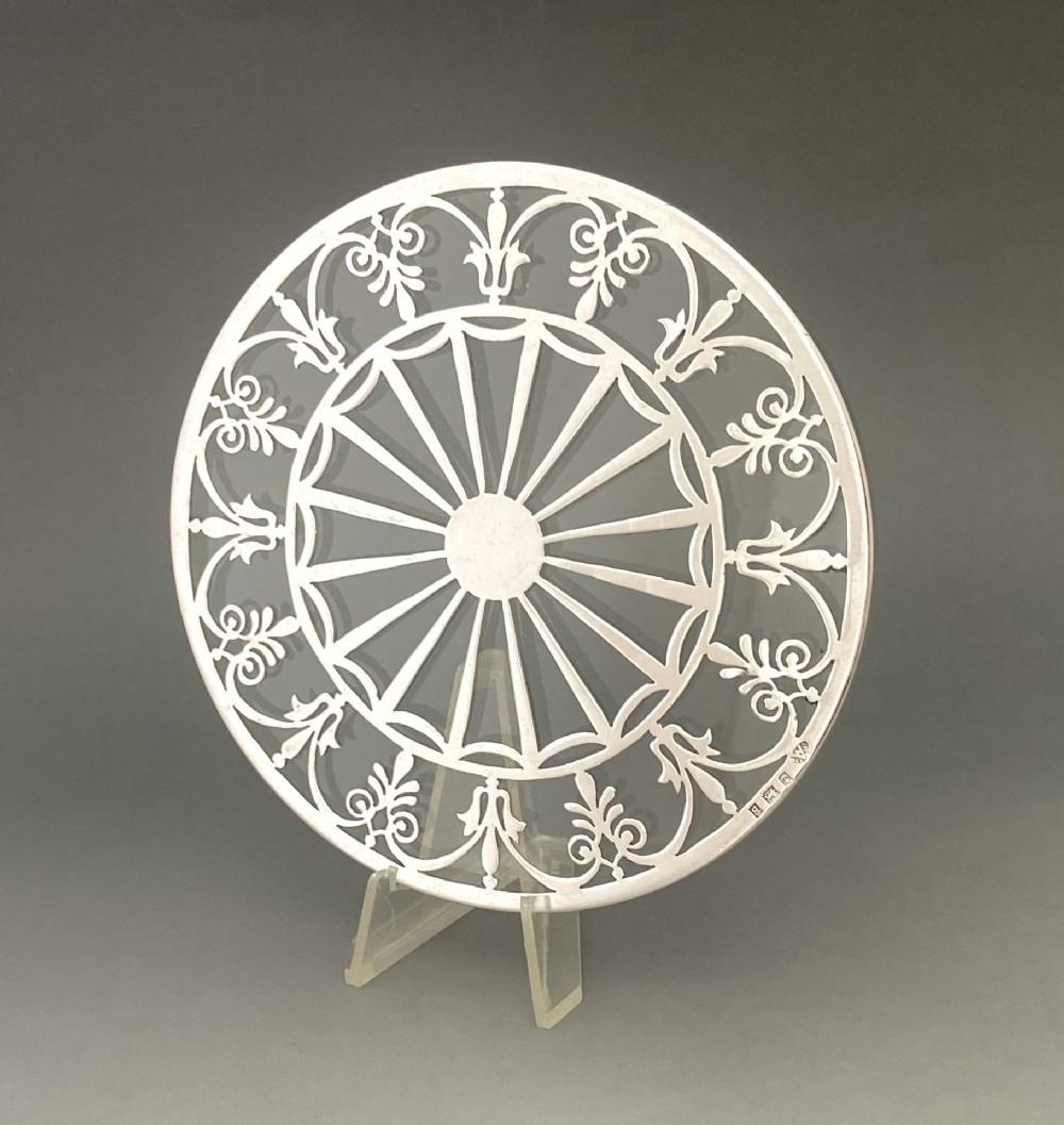 A Gorgeous silver mounted teapot stand or coaster