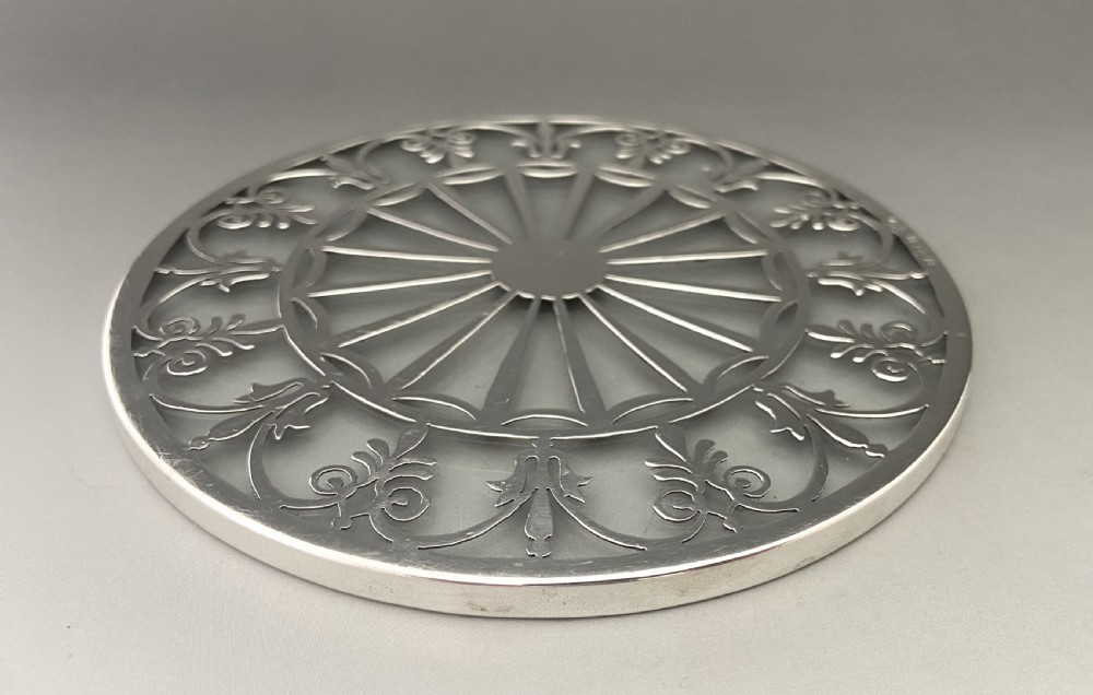 A Gorgeous silver mounted teapot stand or coaster View III