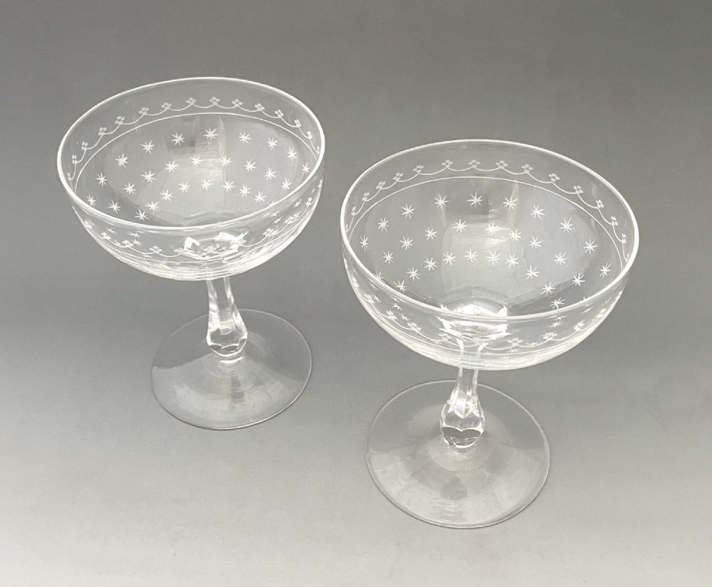 A gorgeous pair of star etched & cut glass champagne glasses View II
