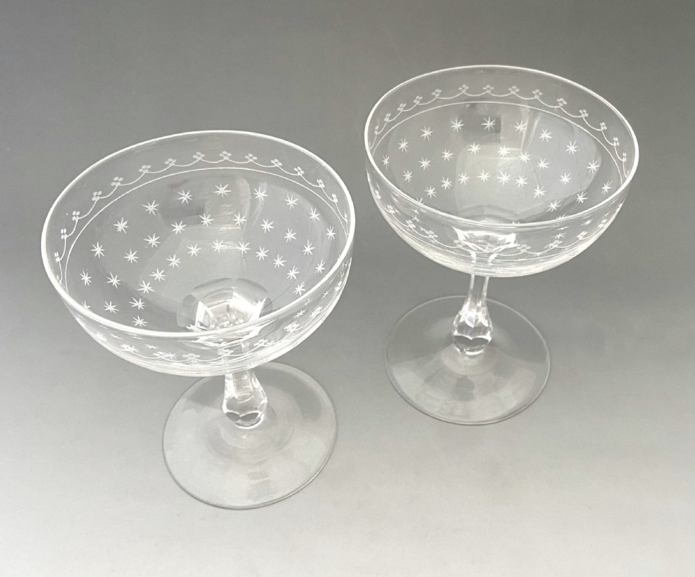 A gorgeous pair of star etched & cut glass champagne glasses View III