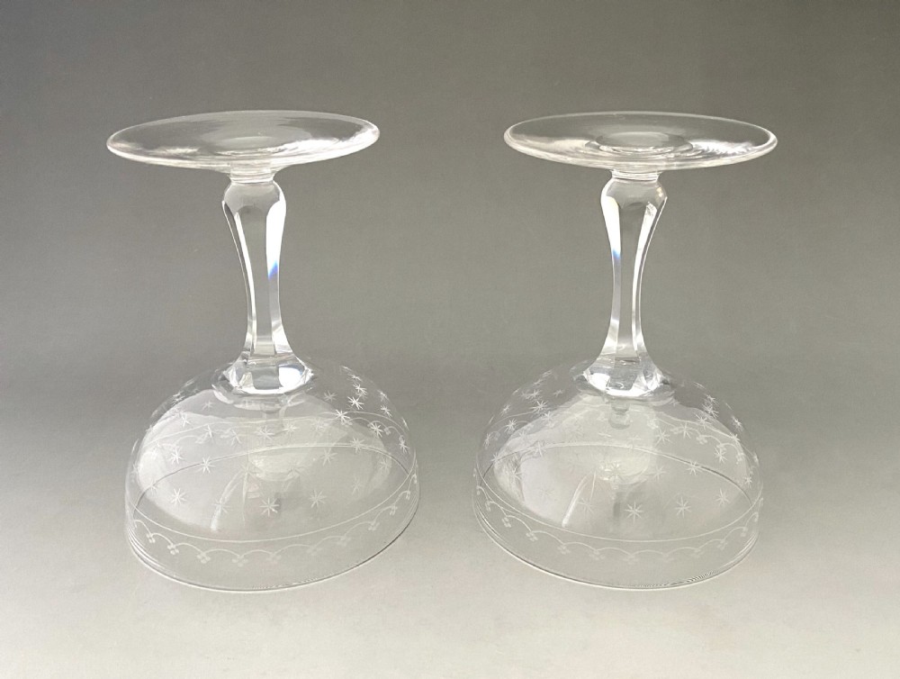 A gorgeous pair of star etched & cut glass champagne glasses View V