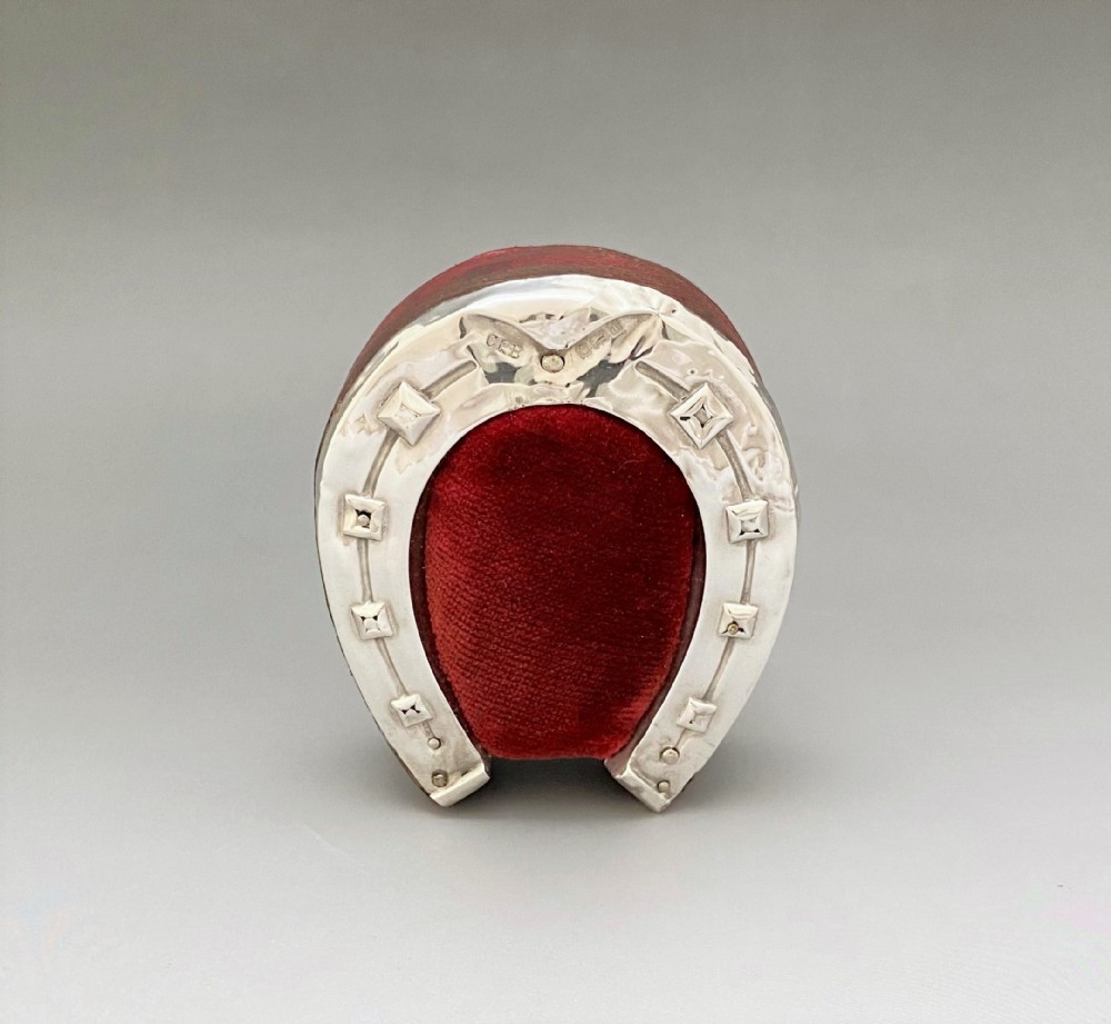 An Edwardian Silver 'good luck' horseshoe Pin Cushion