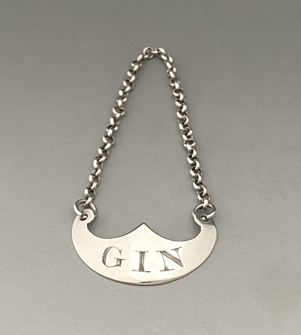 An excellent Scottish silver Gin label