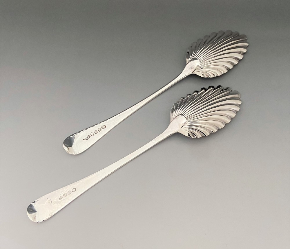 A superb pair of Georgian silver serving spoons View III