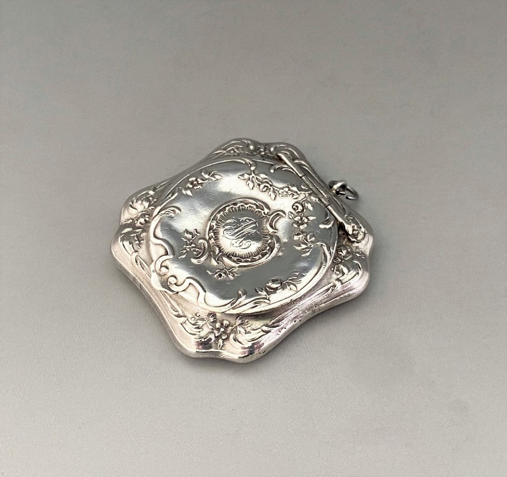 A gorgeous French silver chatelaine/pendant compact