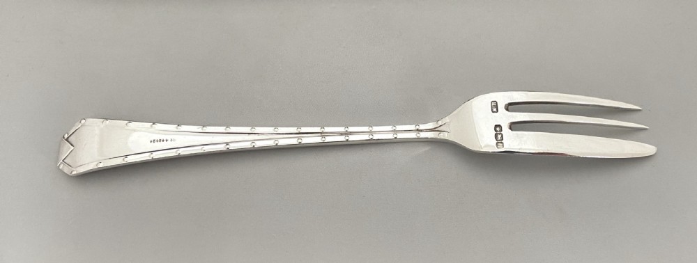 An excellent boxed set of six silver cake forks & serving fork View V
