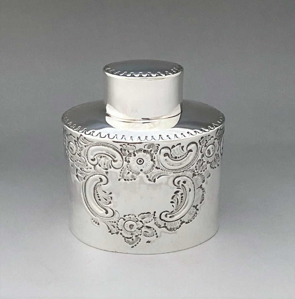 A charming Victorian silver Rococo tea caddy