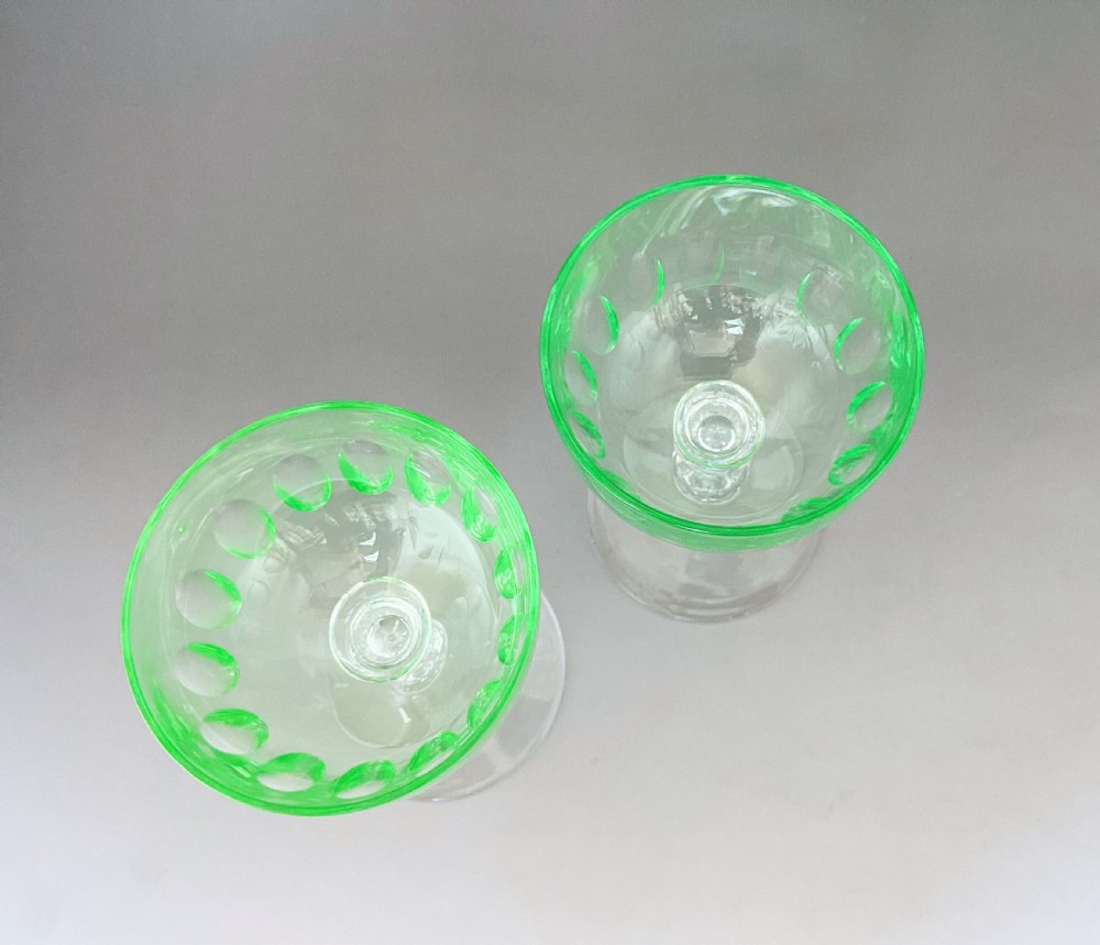 A delightful pair of Victorian uranium bowl dessert wine glasses View II