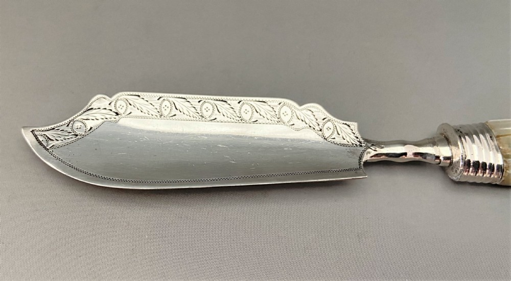 A fine Georgian silver & mother-of-pearl butter knife View III
