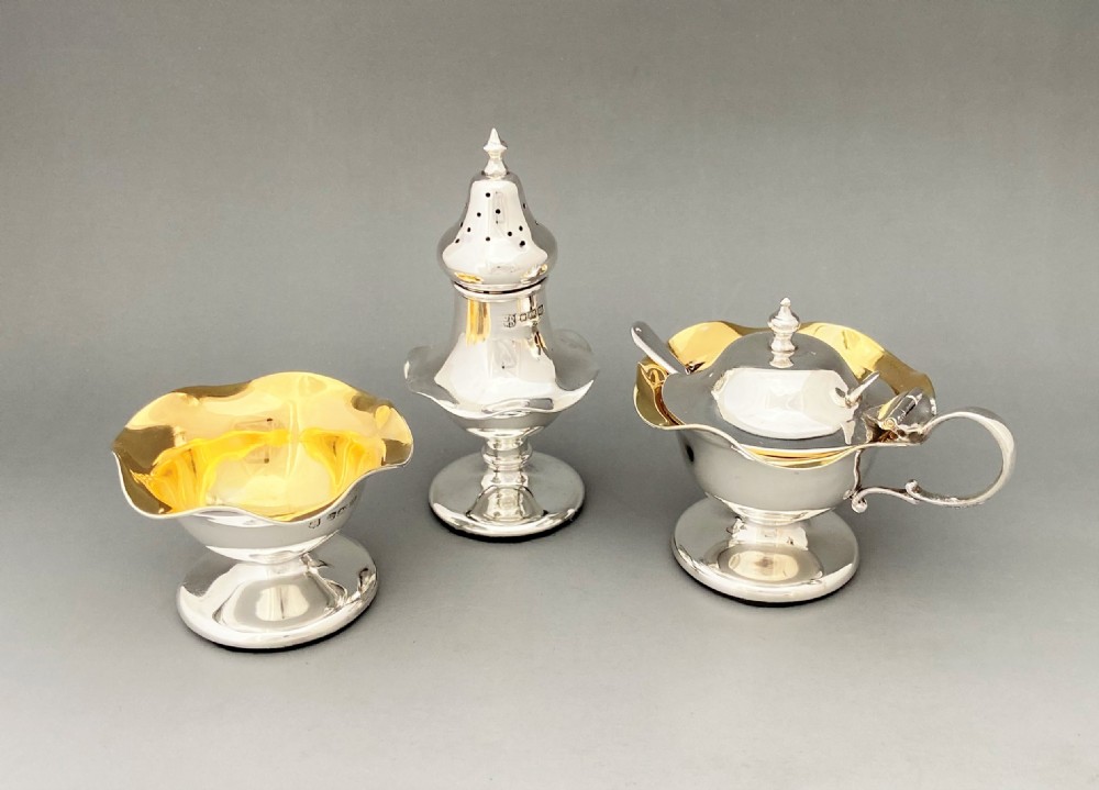 A gorgeous Edwardian three piece silver cruet