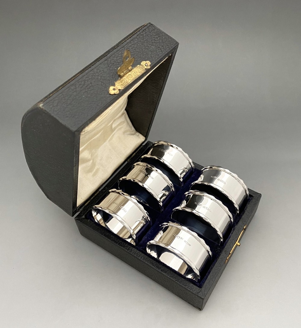A desirable set of six boxed silver napkin rings