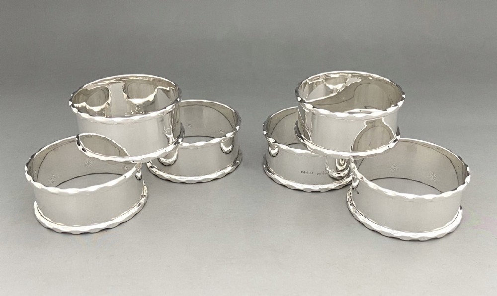 A desirable set of six boxed silver napkin rings View III