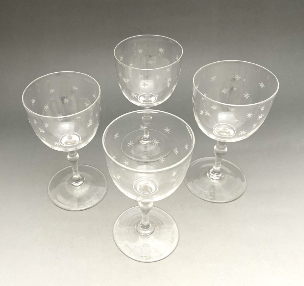 A gorgeous set of 4 Victorian star etched dessert wine glasses View II