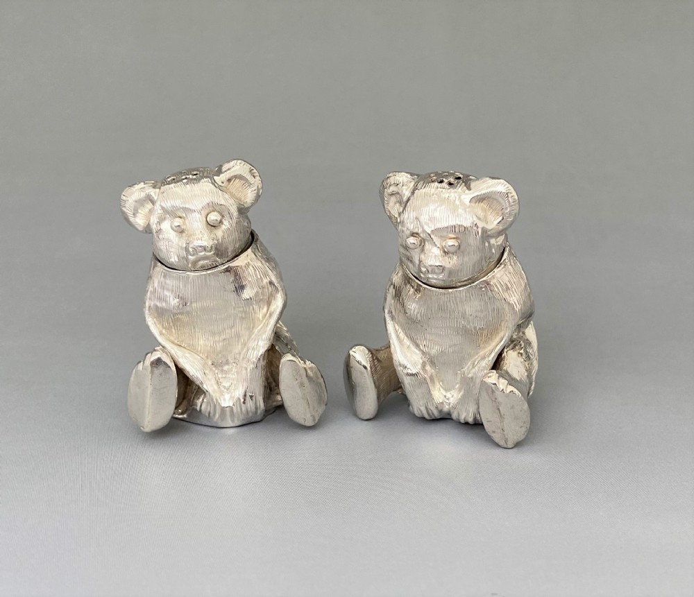 A Gorgeous Pair Of Silver Teddy Bear Pepper pots