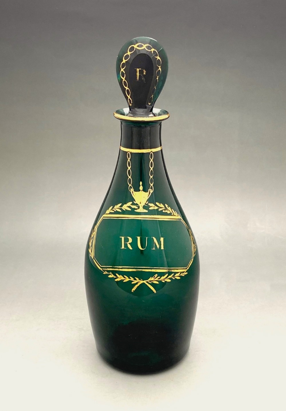 A splendid Bristol Green gilded Rum decanter