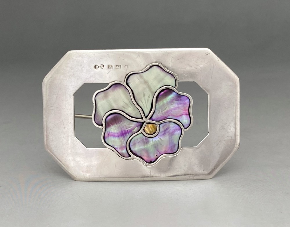 A fabulous silver & mother of pearl buckle brooch