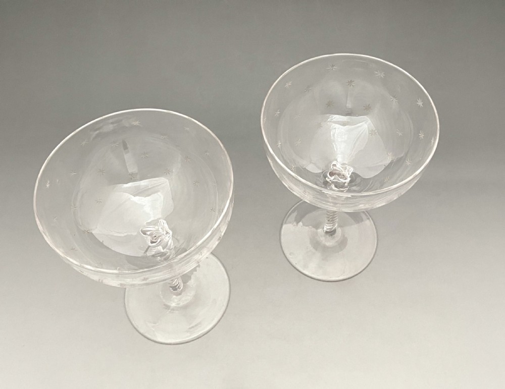 A gorgeous pair of star etched champagne glasses View IV