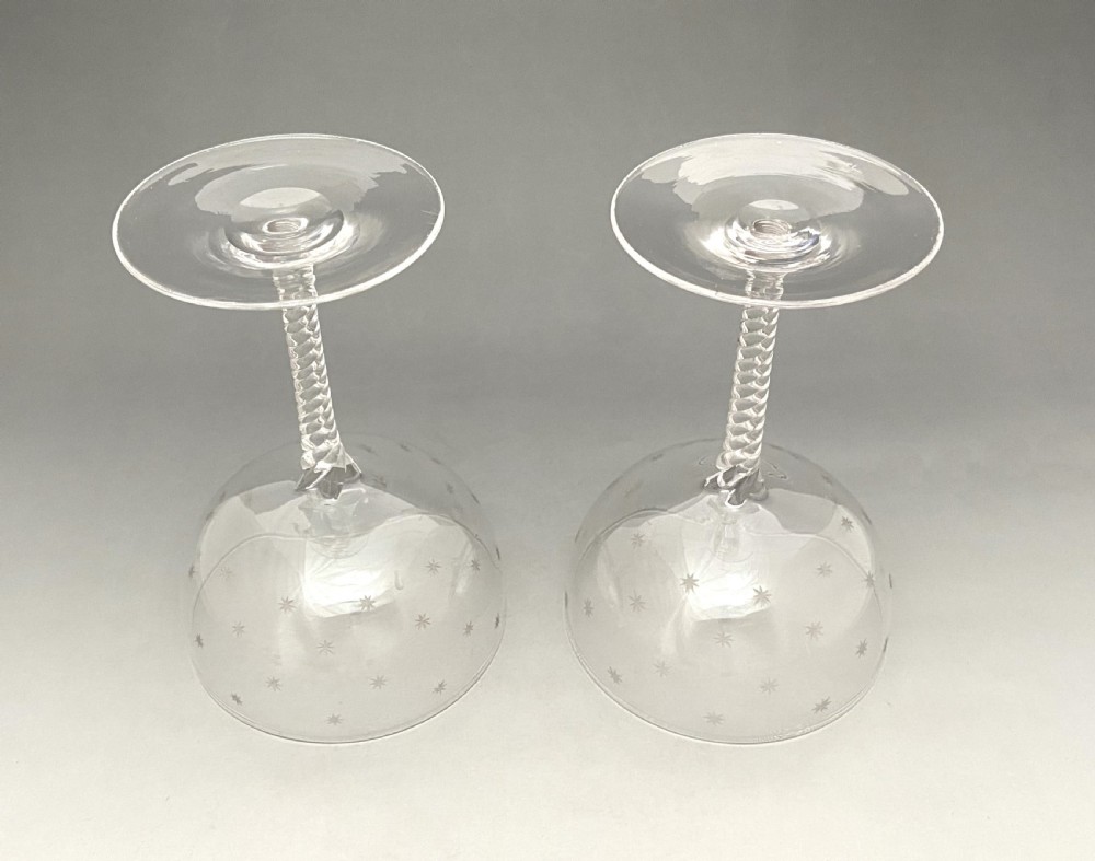 A gorgeous pair of star etched champagne glasses View V