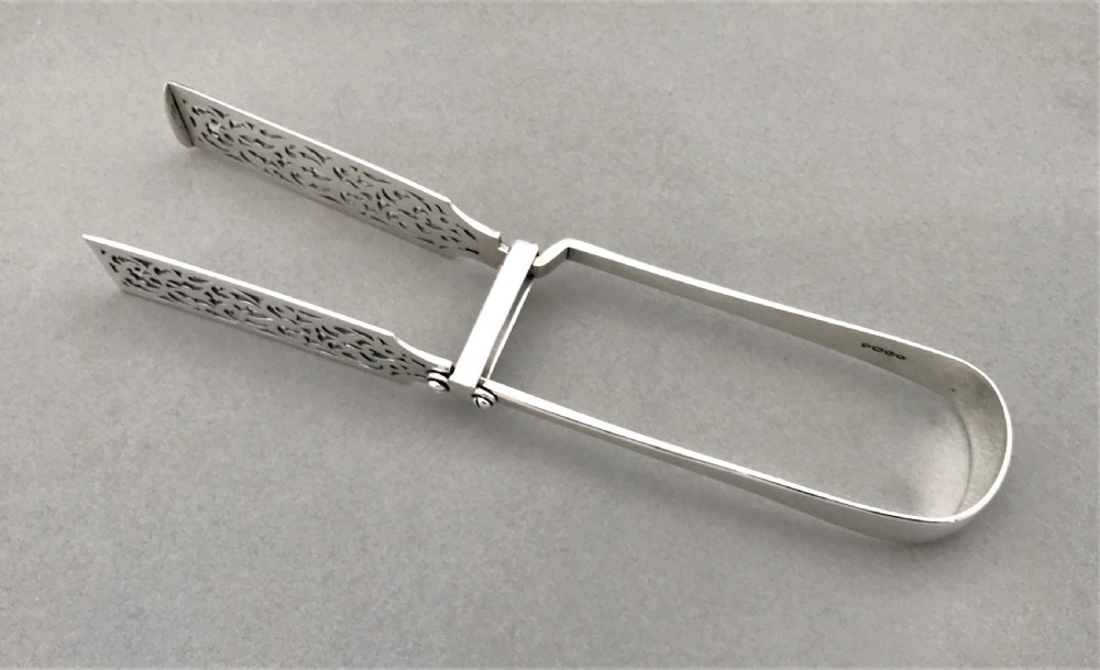 A quality Pair Of Mid Victorian Silver Asparagus Tongs View II