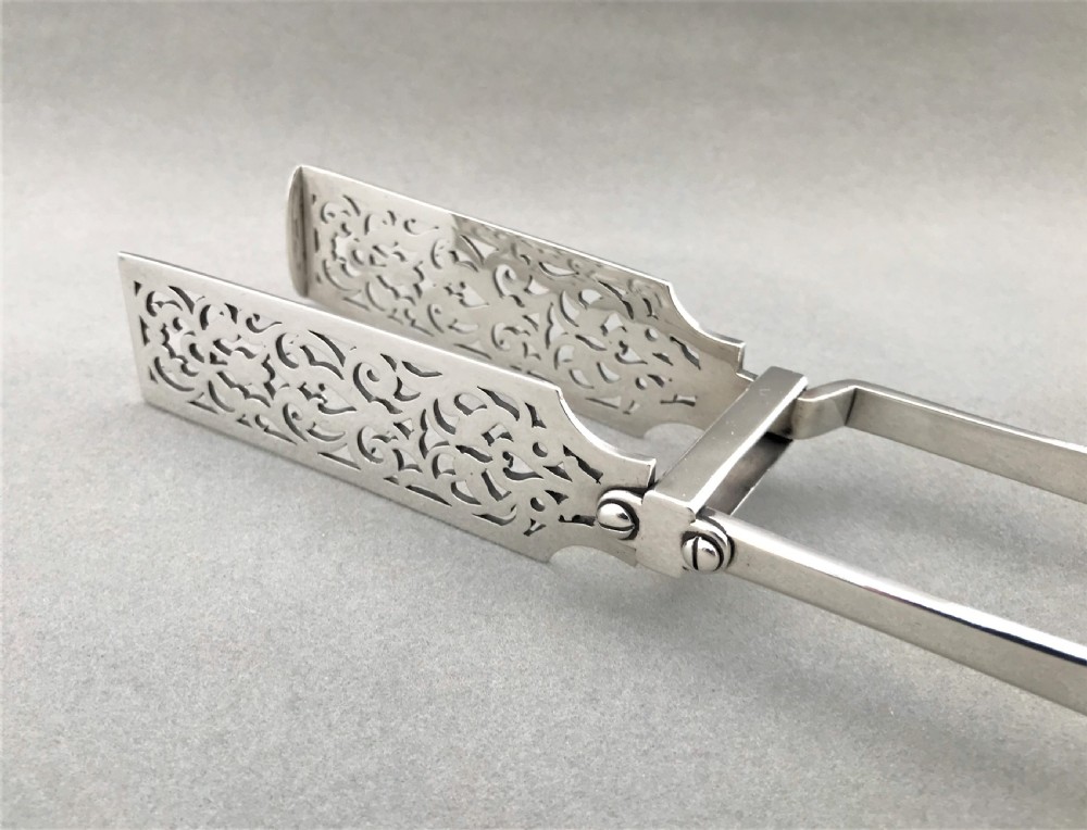 A quality Pair Of Mid Victorian Silver Asparagus Tongs View V