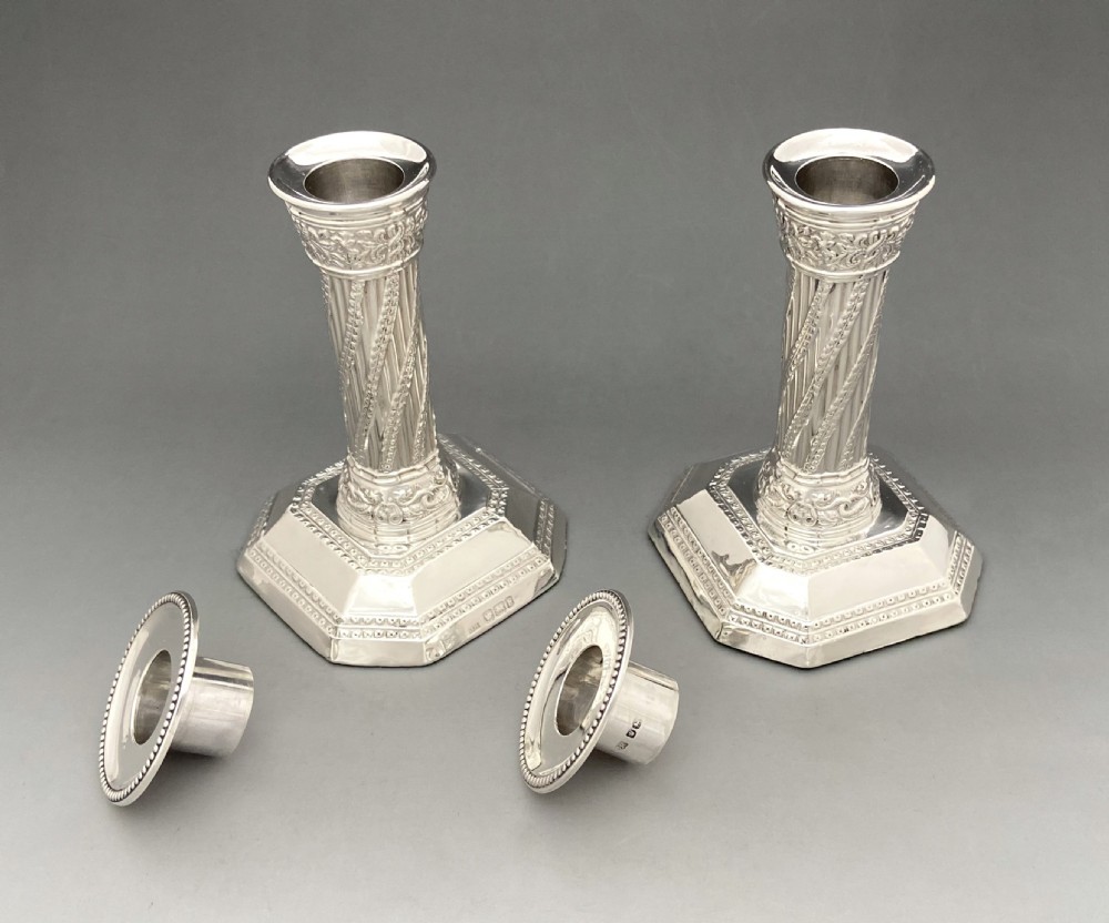 An attractive pair of Victorian silver Corinthian column candlesticks View V