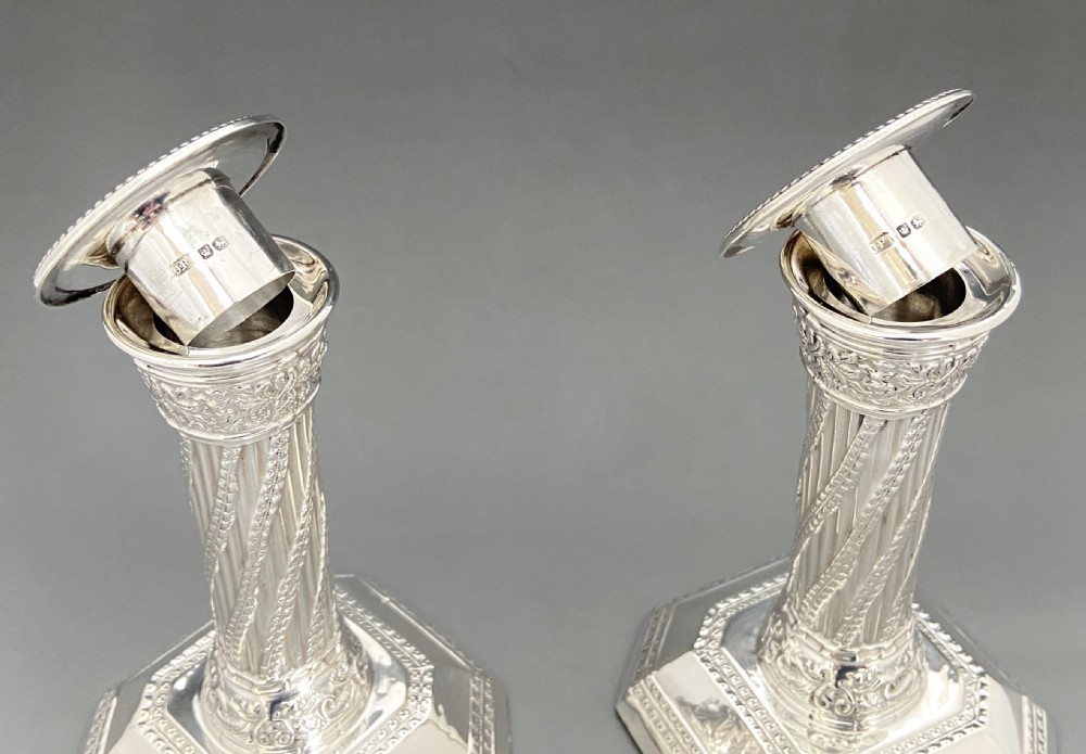 An attractive pair of Victorian silver Corinthian column candlesticks View VI