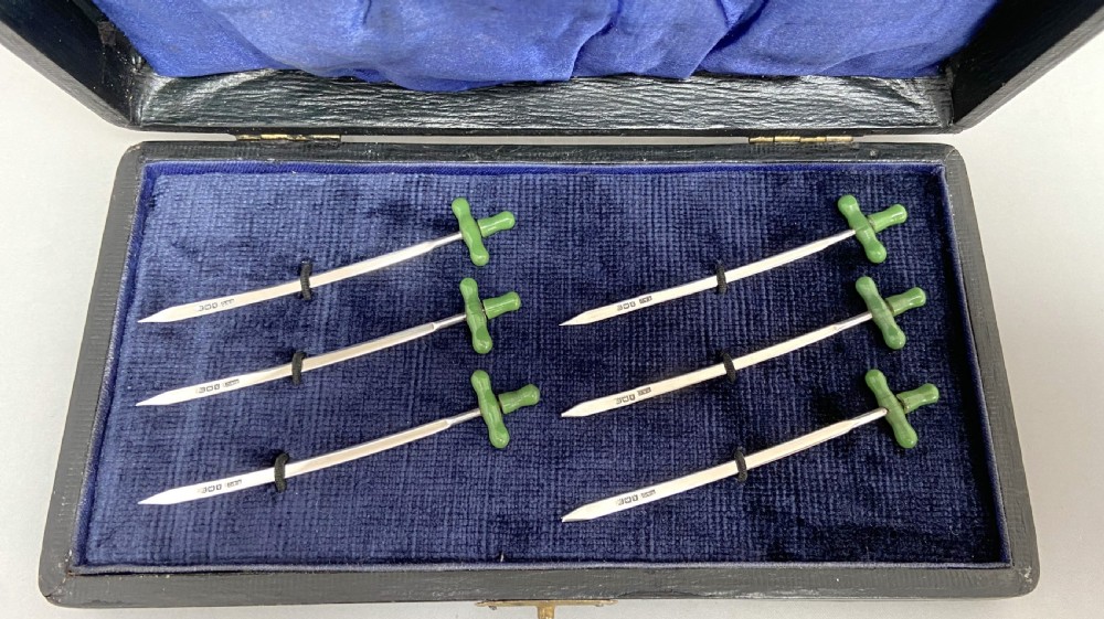 A rare & unusual boxed set of 6 hallmarked silver cocktail sticks View II