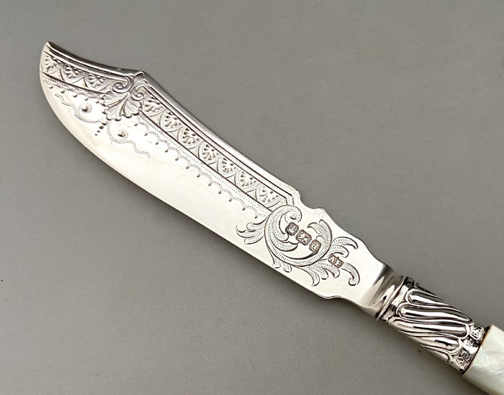 A Charming Victorian silver & mother-of-pearl butter knife View III