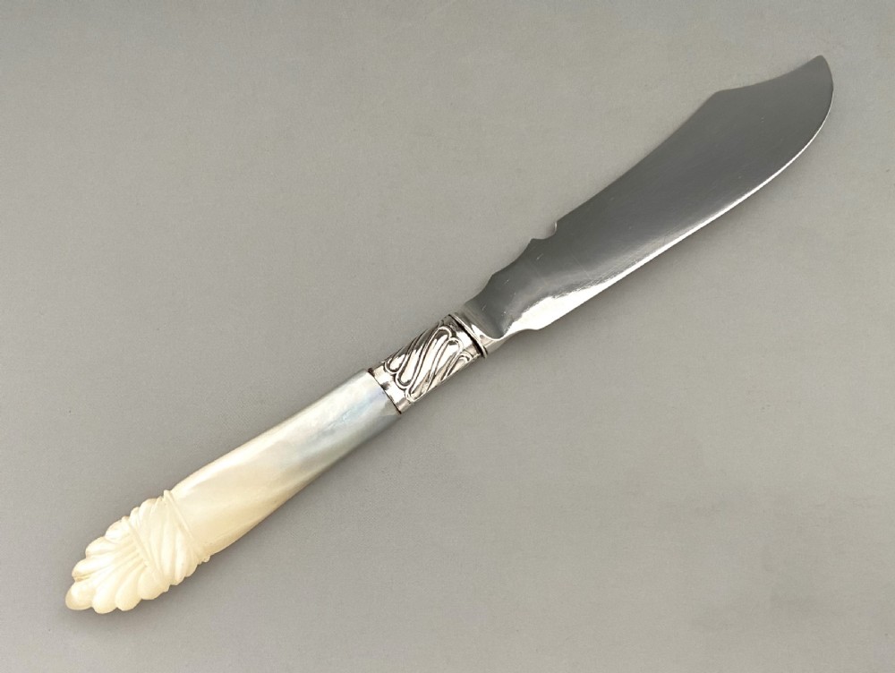 A Charming Victorian silver & mother-of-pearl butter knife View IV