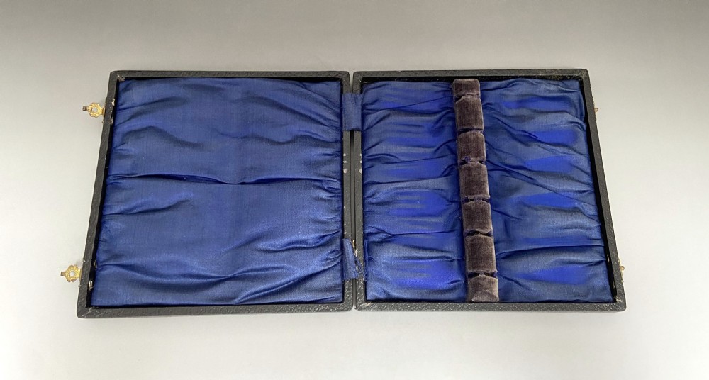 An excellent boxed set of 6 silver cake forks View VII
