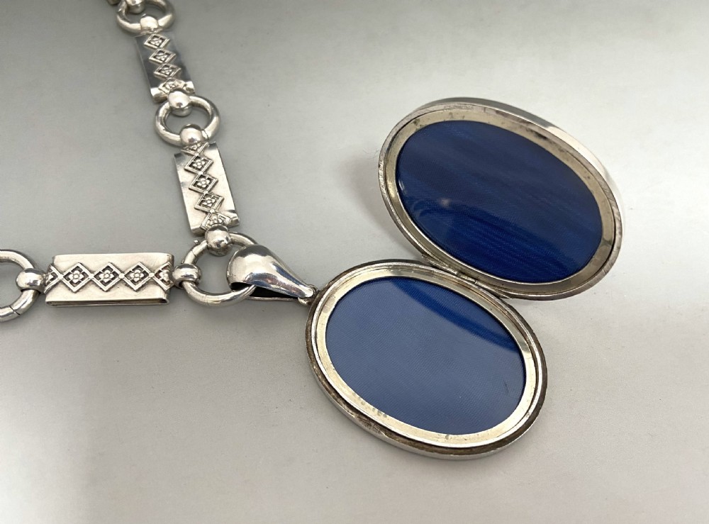An unusual late Victorian silver neck chain & locket View VII