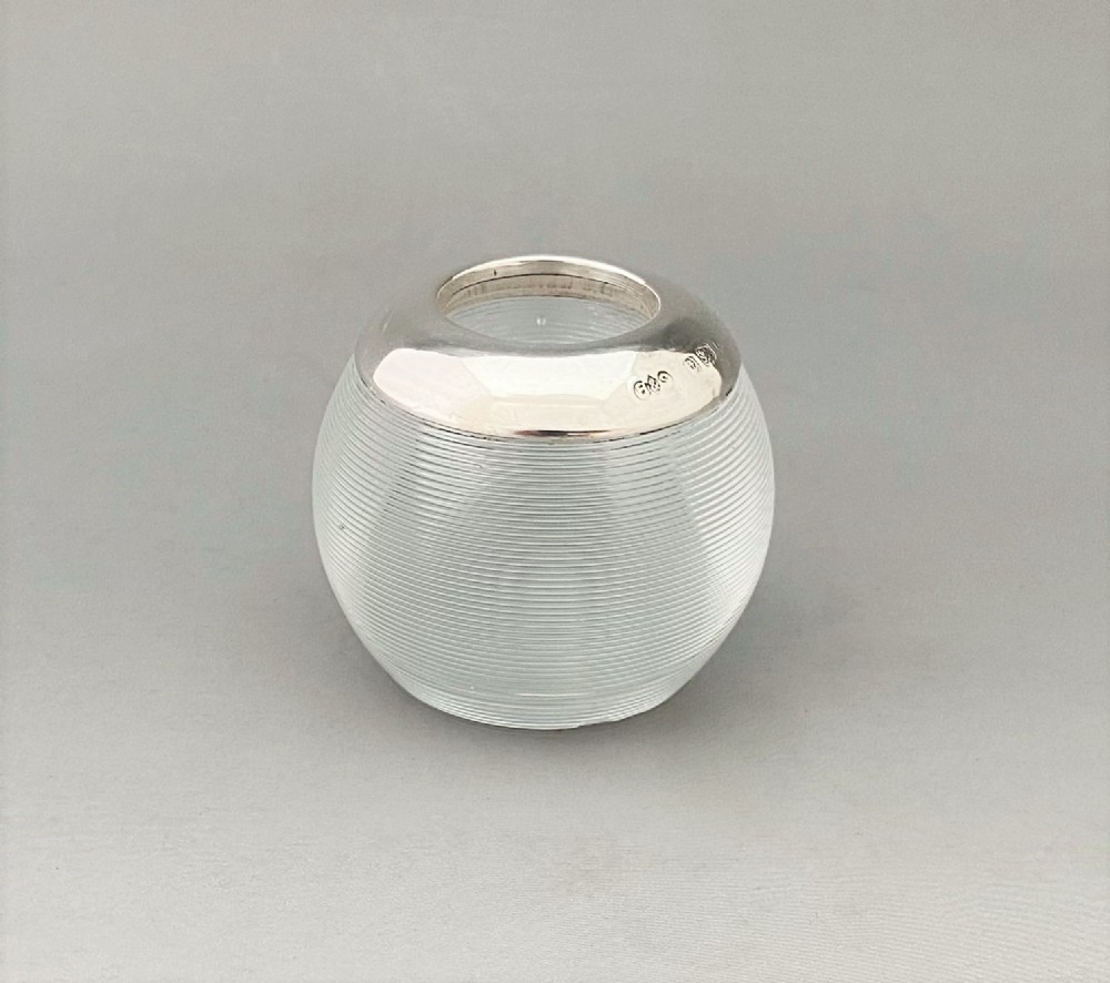 A handsome Edwardian silver mounted match striker