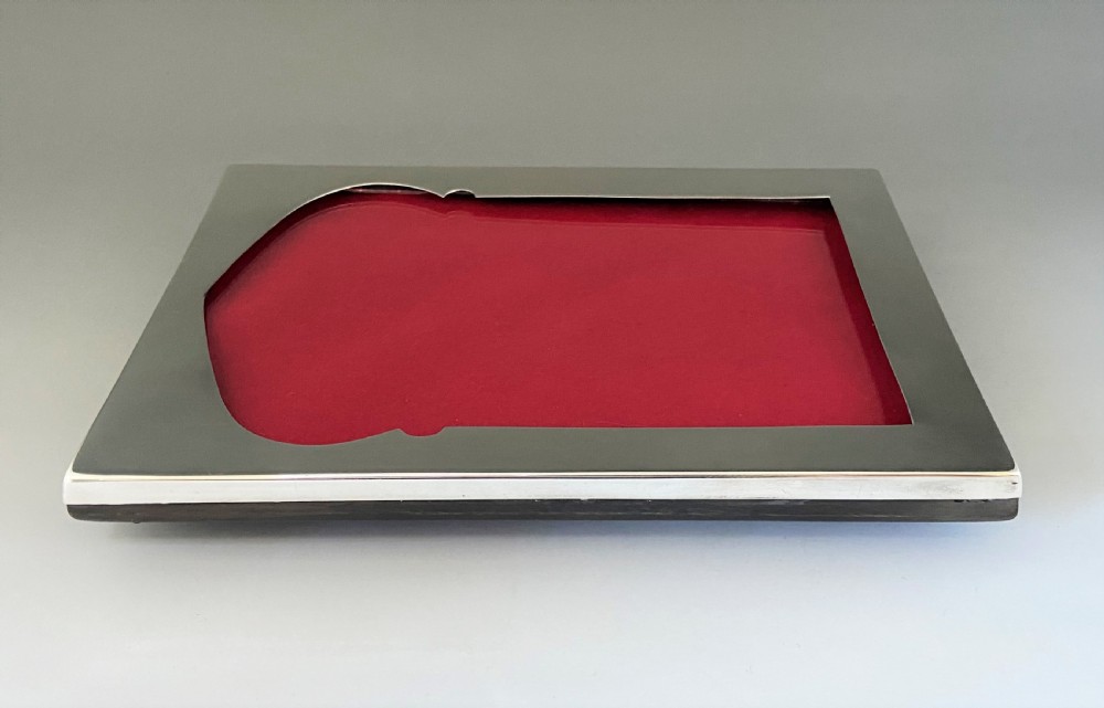An attractive silver photo frame of unusual design View VI