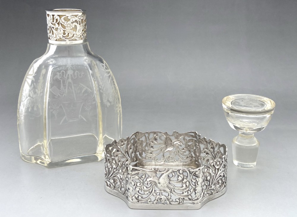 An exquisite Dutch silver mounted perfume/ cologne bottle  View X