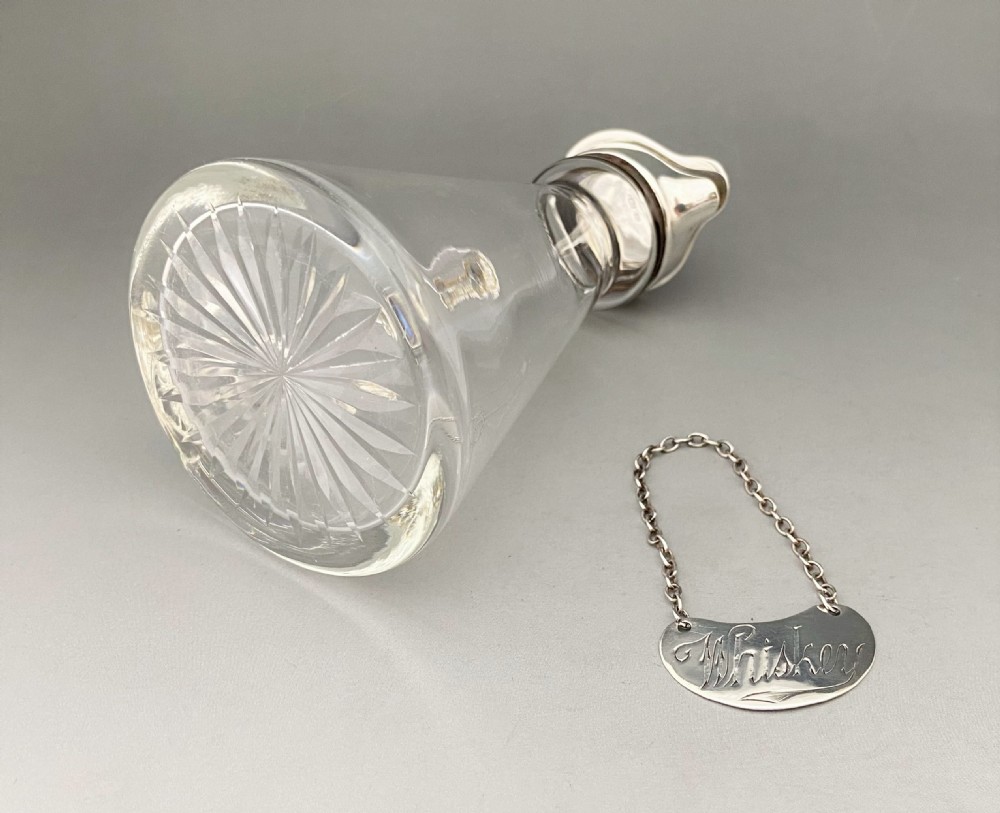 A handsome silver Whisky tot with silver label View IV
