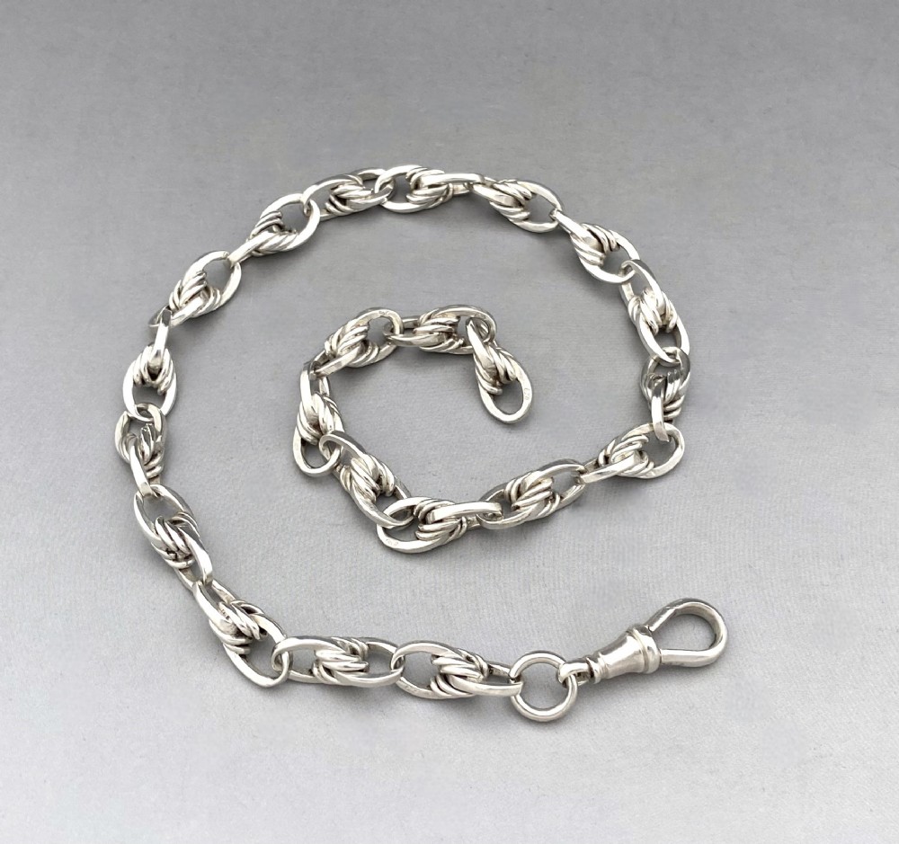 A useful Edwardian silver Albert chain