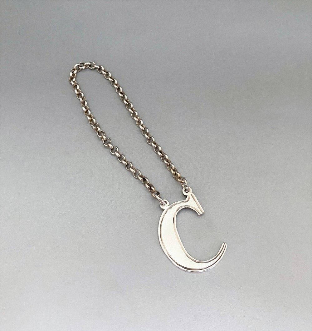 A stylish early Victorian silver Claret label