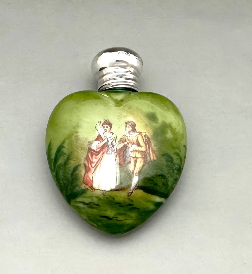 An Edwardian Heart Shaped Silver Mounted Scent Bottle