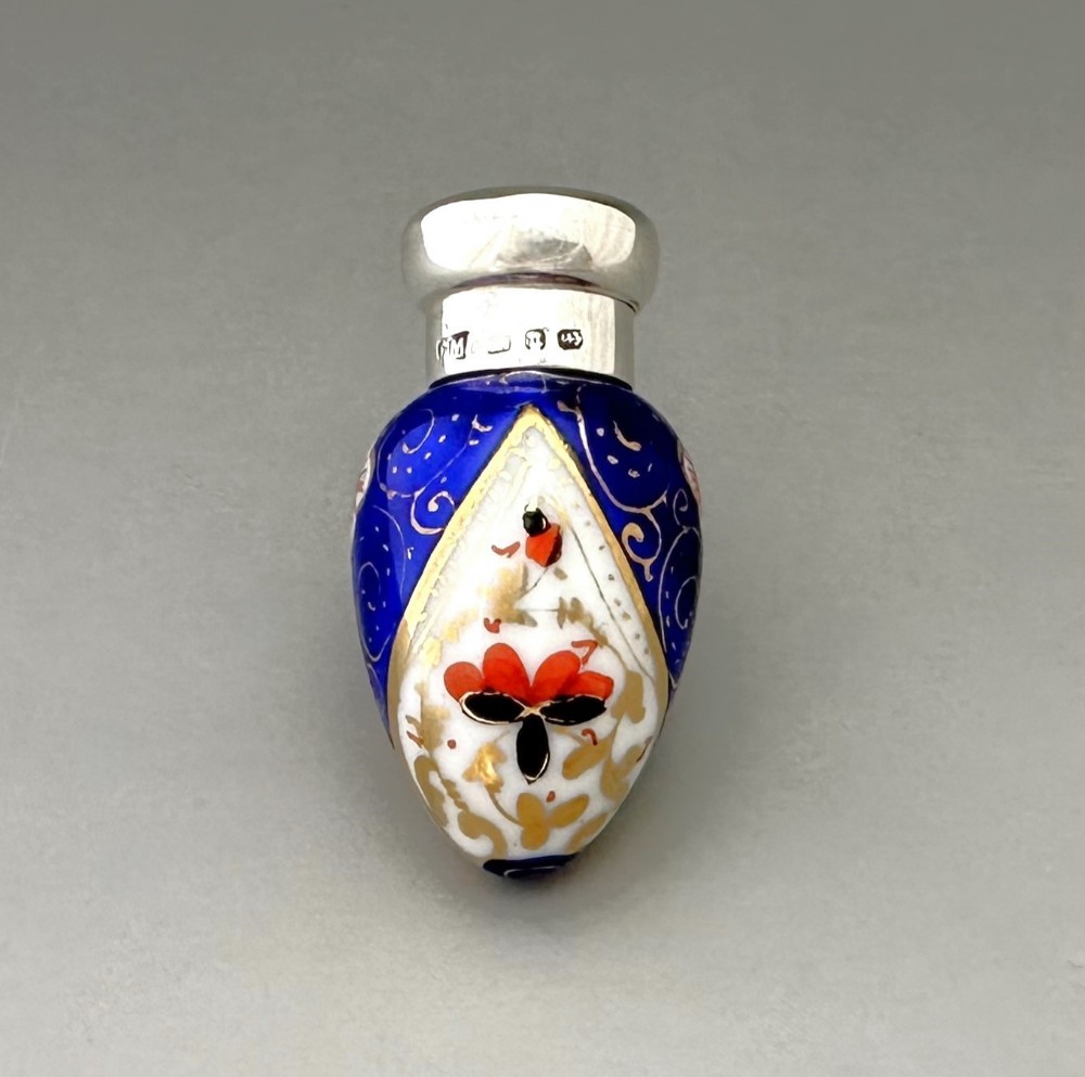 An exquisite silver mounted Imari pattern scent bottle