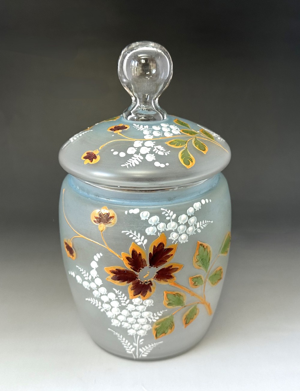 A lovely enamel painted Victorian glass biscuit barrel