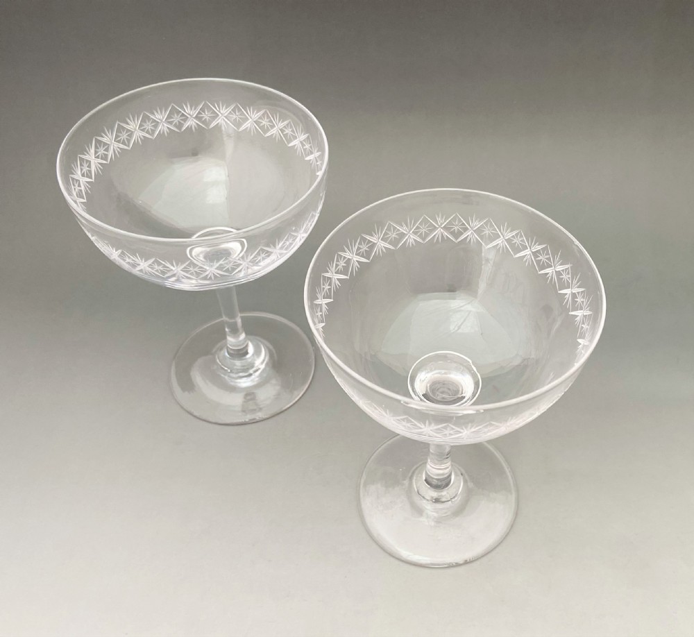 An elegant pair of star cut glass champagne bowls View II