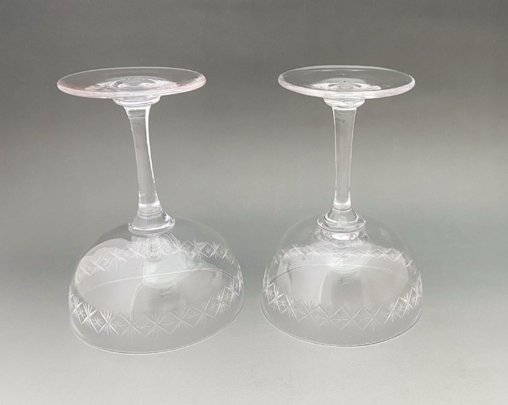 An elegant pair of star cut glass champagne bowls View III