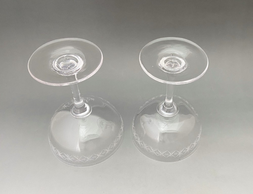 An elegant pair of star cut glass champagne bowls View IV