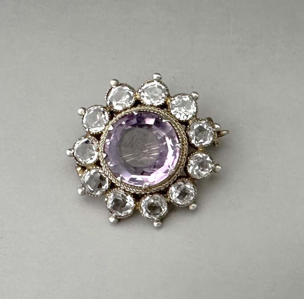 A late Victorian silver cluster brooch