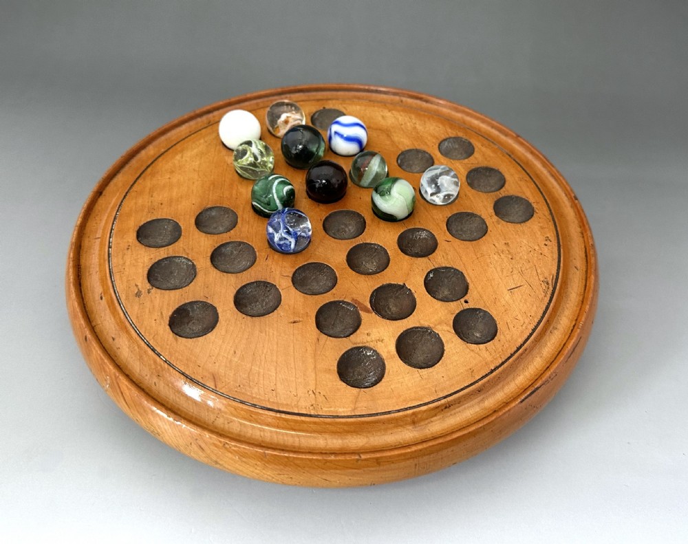 An attractive Victorian Solitaire board & glass marbles View III