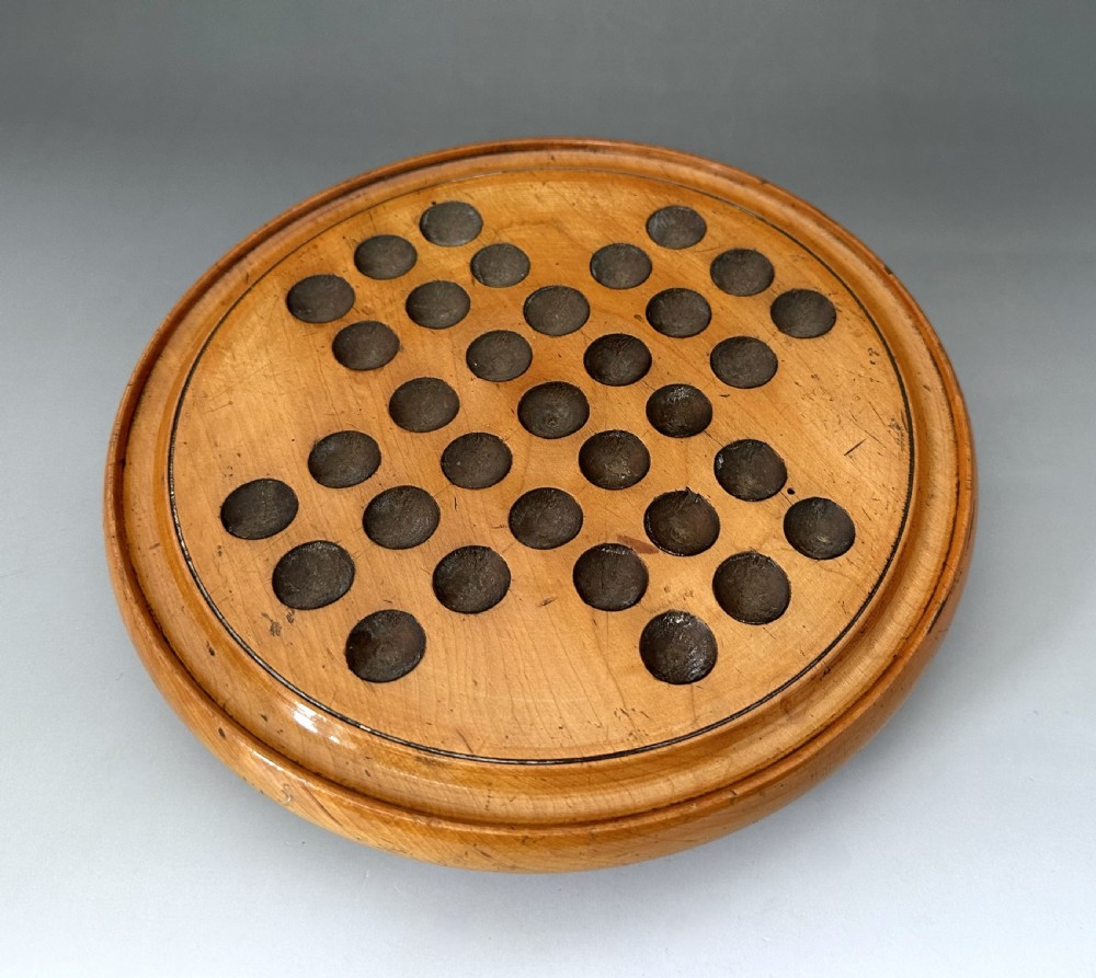 An attractive Victorian Solitaire board & glass marbles View V