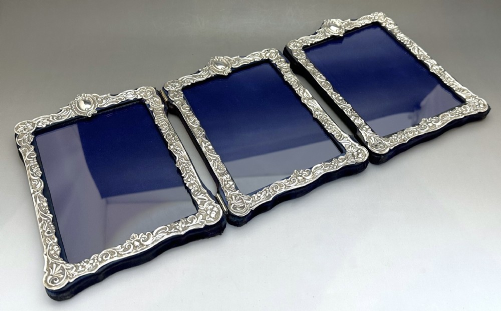 A superb Victorian silver triple photo frame View VIII