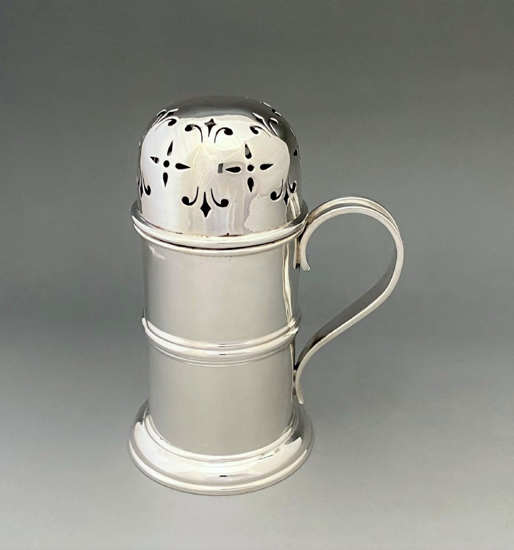 An attractive George V silver sugar caster