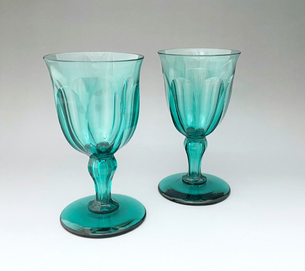 A gorgeous pair of Victorian aqua green wine glasses
